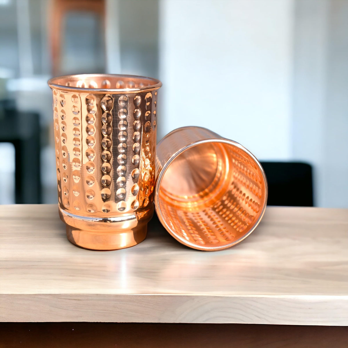 HEALTHANDWEALTH polka-dot copper tumbler adds style to daily water rituals.