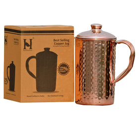HealthGoodsIn hammered copper pitcher highlights artisanal texture for daily use.