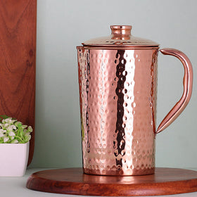 HealthGoodsIn pure copper pitcher in unlined, uncoated finish.