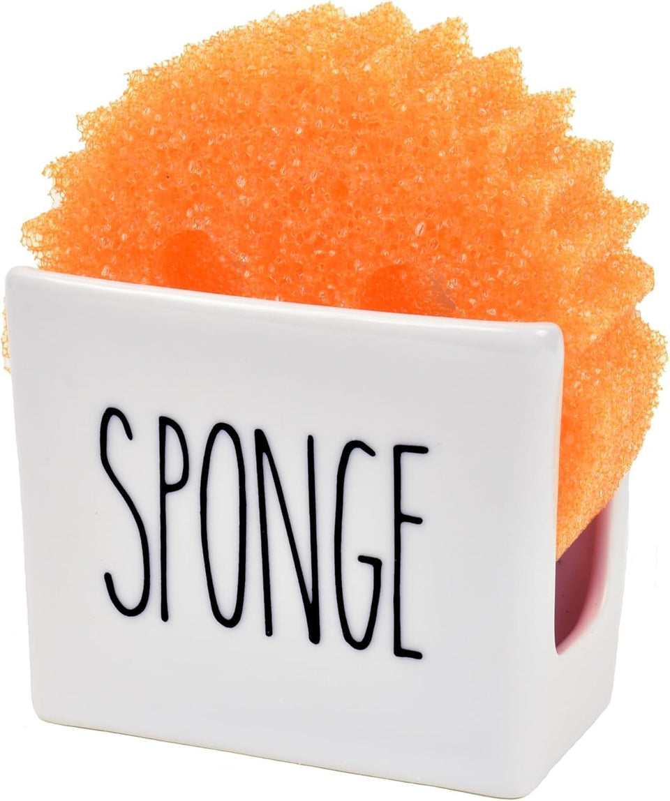 Heartland Home porcelain sponge holder on a kitchen sink keeps sponges organized and accessible.
