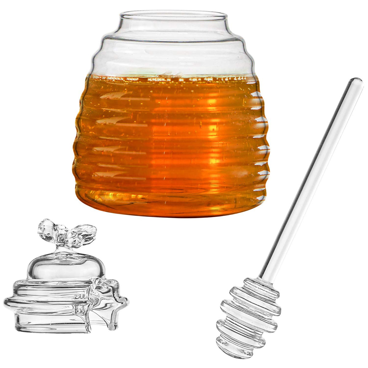 Clear hedume glass beehive honey pot shown on a countertop.