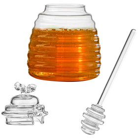 Clear hedume glass beehive honey pot shown on a countertop.