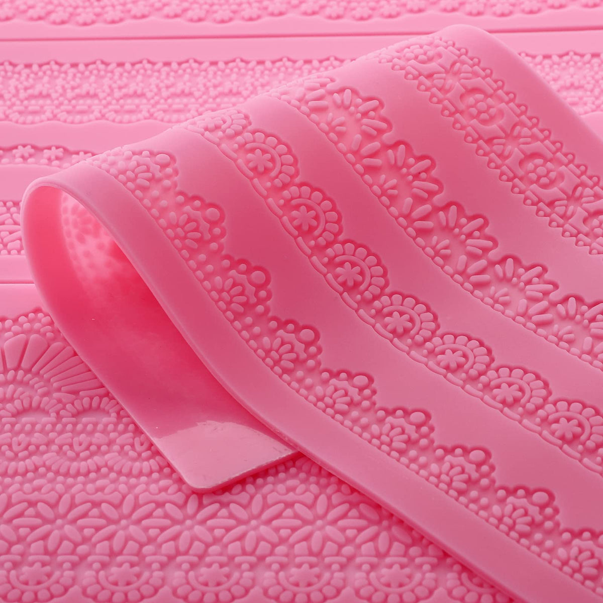 Hedume lace mold petal design creates delicate sugar paste accents