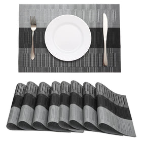 HeloHo black grey stripe placemats on table adding coordinated style and protection.