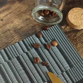 HeloHo placemats texture close-up shows durable vinyl-polyester weave protecting surfaces.