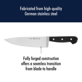 Henckels Classic 8-inch chef knife slicing salmon for clean cuts.