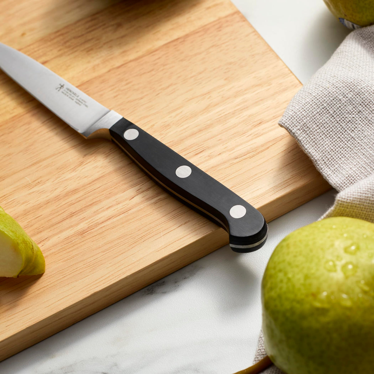 Henckels Classic stainless steel blade with a bright finish and reliable performance