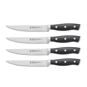HENCKELS Forged Accent razor-sharp steak knife set of four for precise slicing.