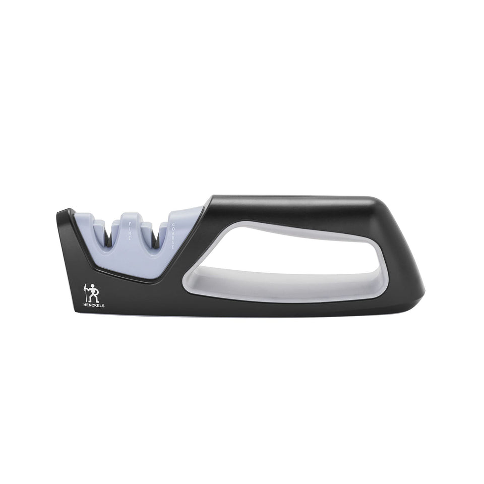 Henckels handheld sharpener with a coarse ceramic stage for quick edge refresh.