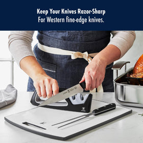 Henckels sharpener featuring ergonomic handle and safety grip for stable use.