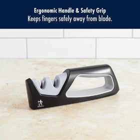Henckels handheld sharpener with a fine ceramic stage for a polished edge.