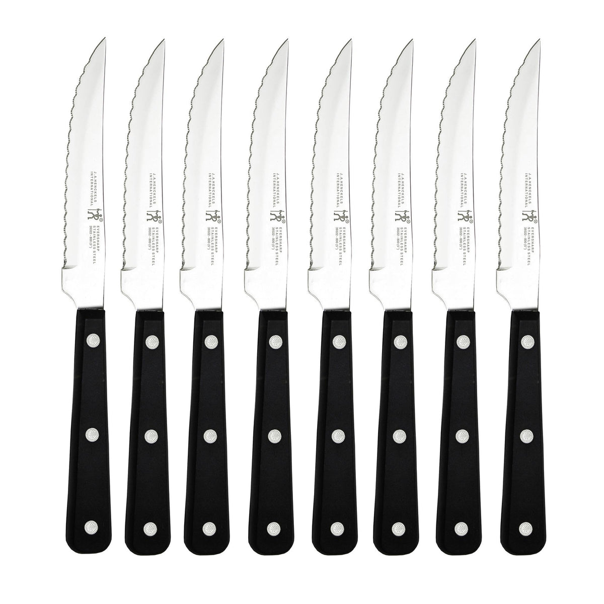 HENCKELS eight-piece steak knife set blade closeup for precise, effortless slicing