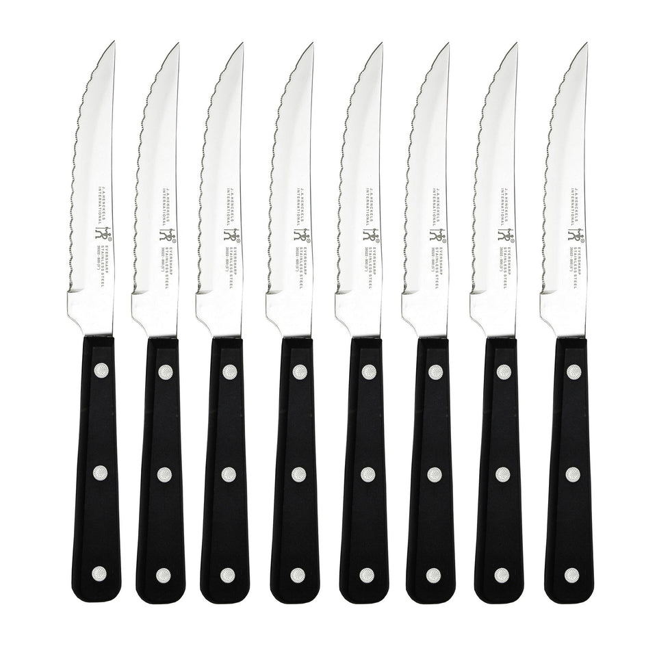 HENCKELS eight-piece steak knife set blade closeup for precise, effortless slicing