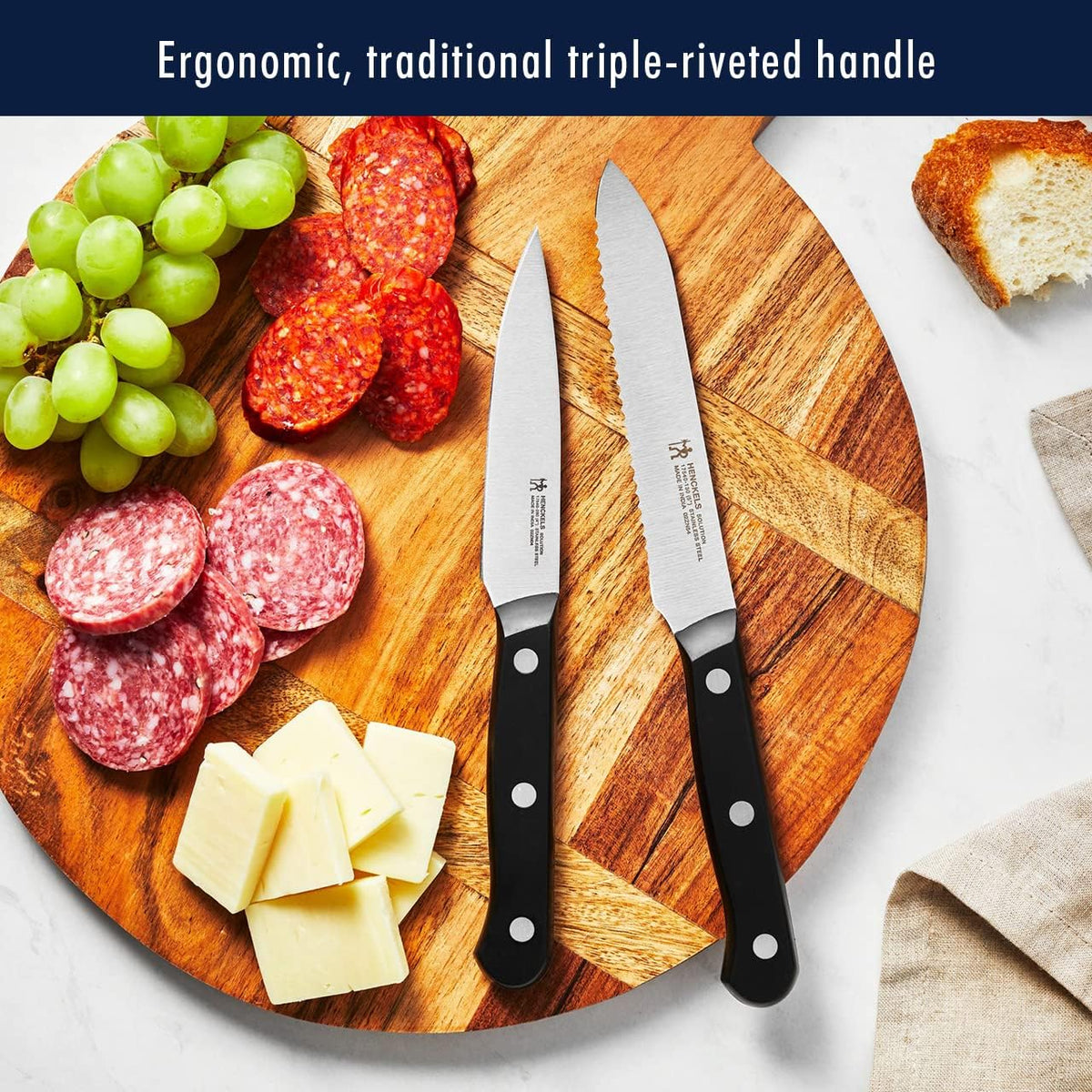 HENCKELS Solution 4-inch paring knife for peeling and trimming.