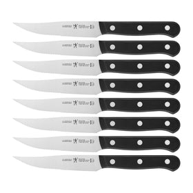 HENCKELS Solution razor-sharp steak knives for precise slicing and effortless serving.