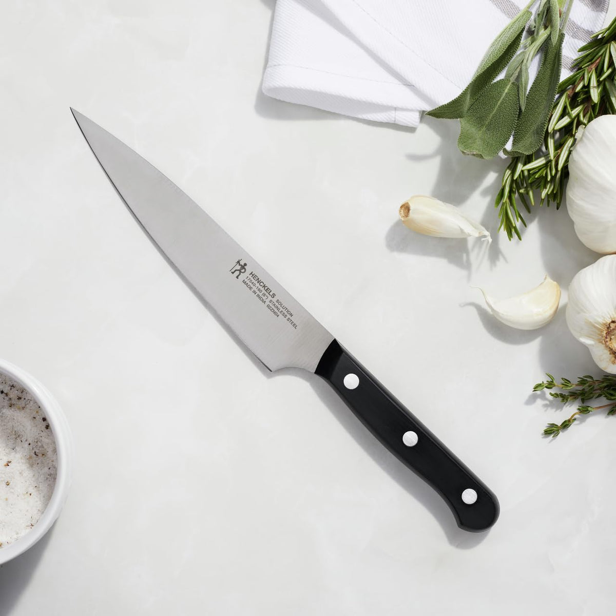 Henckels stainless steel blade stays sharp longer for everyday use.