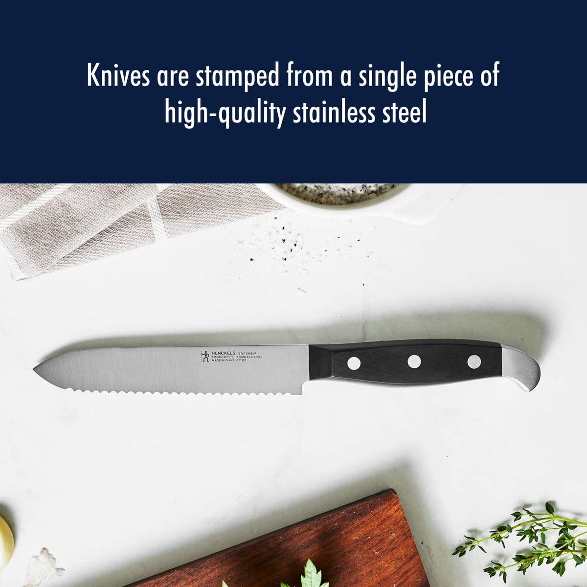 Henckels Statement 5 inch serrated knife cleanly cuts crusty bread.