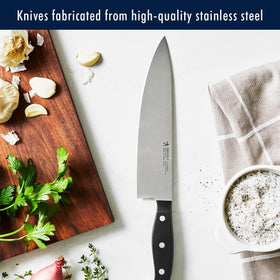 HENCKELS Statement 5-inch serrated utility knife handles soft interiors and firm exteriors with control.
