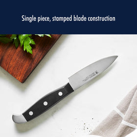 Henckels Statement 6-inch utility knife versatile for chopping and slicing.