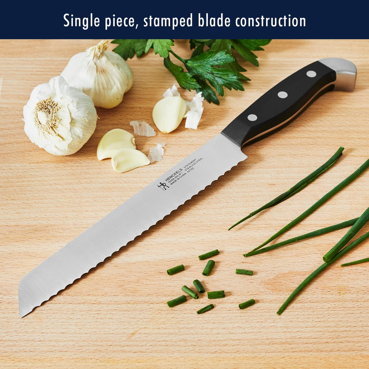 HENCKELS Statement 7-inch hollow edge Santoku for smooth mincing