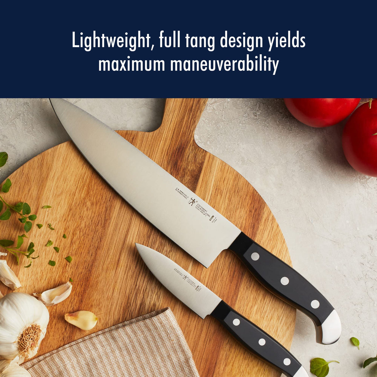 HENCKELS 7-inch santoku with grantons reduces sticking while mincing.