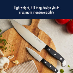 HENCKELS 7-inch santoku with grantons reduces sticking while mincing.