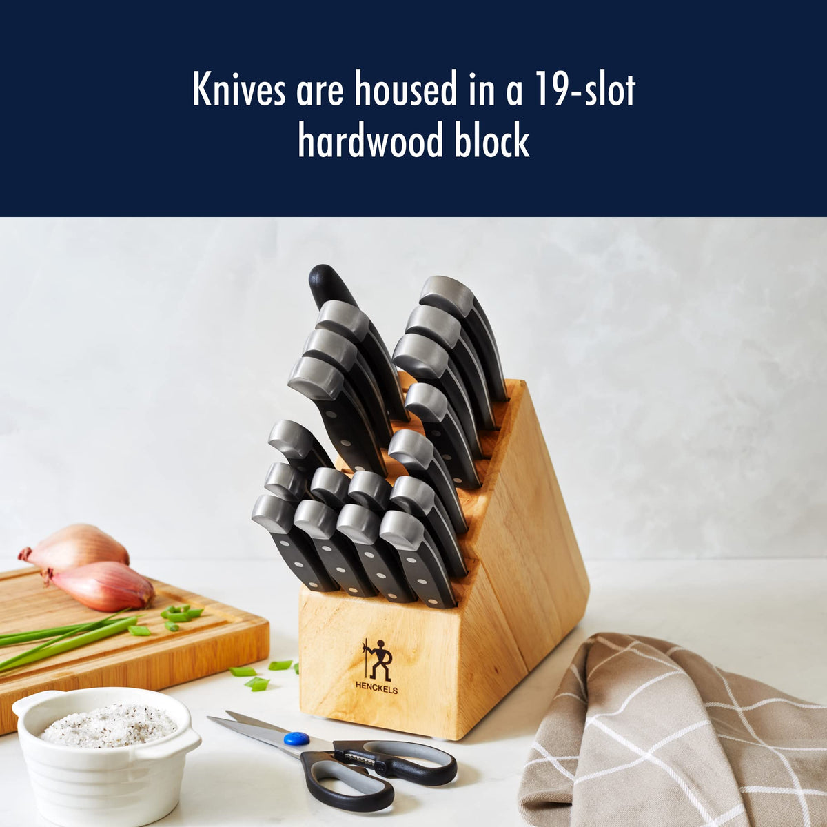 Henckels Statement 8-inch bread knife slicing crusty bread.