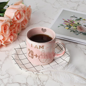 Hendson pink marble mug on breakfast table, perfect for hot beverages