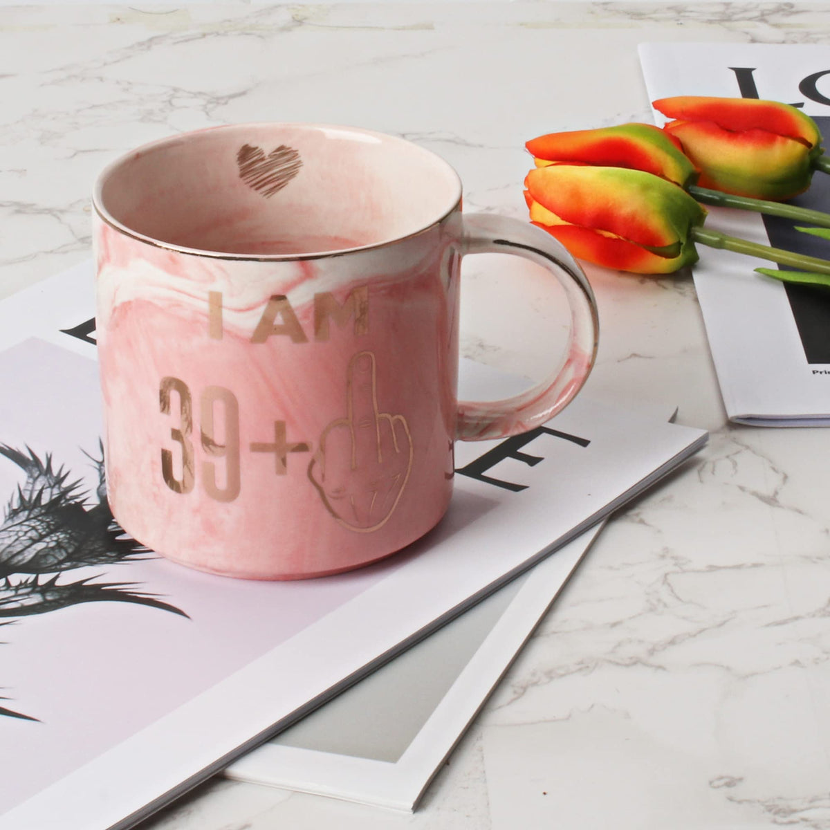 Hendson pink marbled mug with golden accents enhances desk or kitchen space