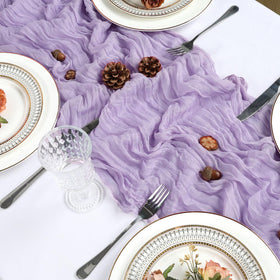 Heneger lilac table runner styled as chair sash accents for coordinated decor.