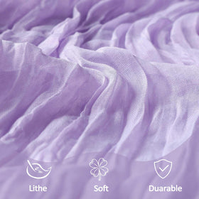 Heneger lilac cheesecloth runner used to wrap gifts with a delicate touch.