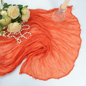 Care instructions for Heneger orange cheesecloth runner to preserve crinkle and color