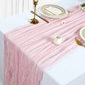 Heneger pink table runner used as wedding decor for boho chic tables.