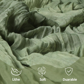 Heneger cheesecloth runner pairs with natural tones for elegance.