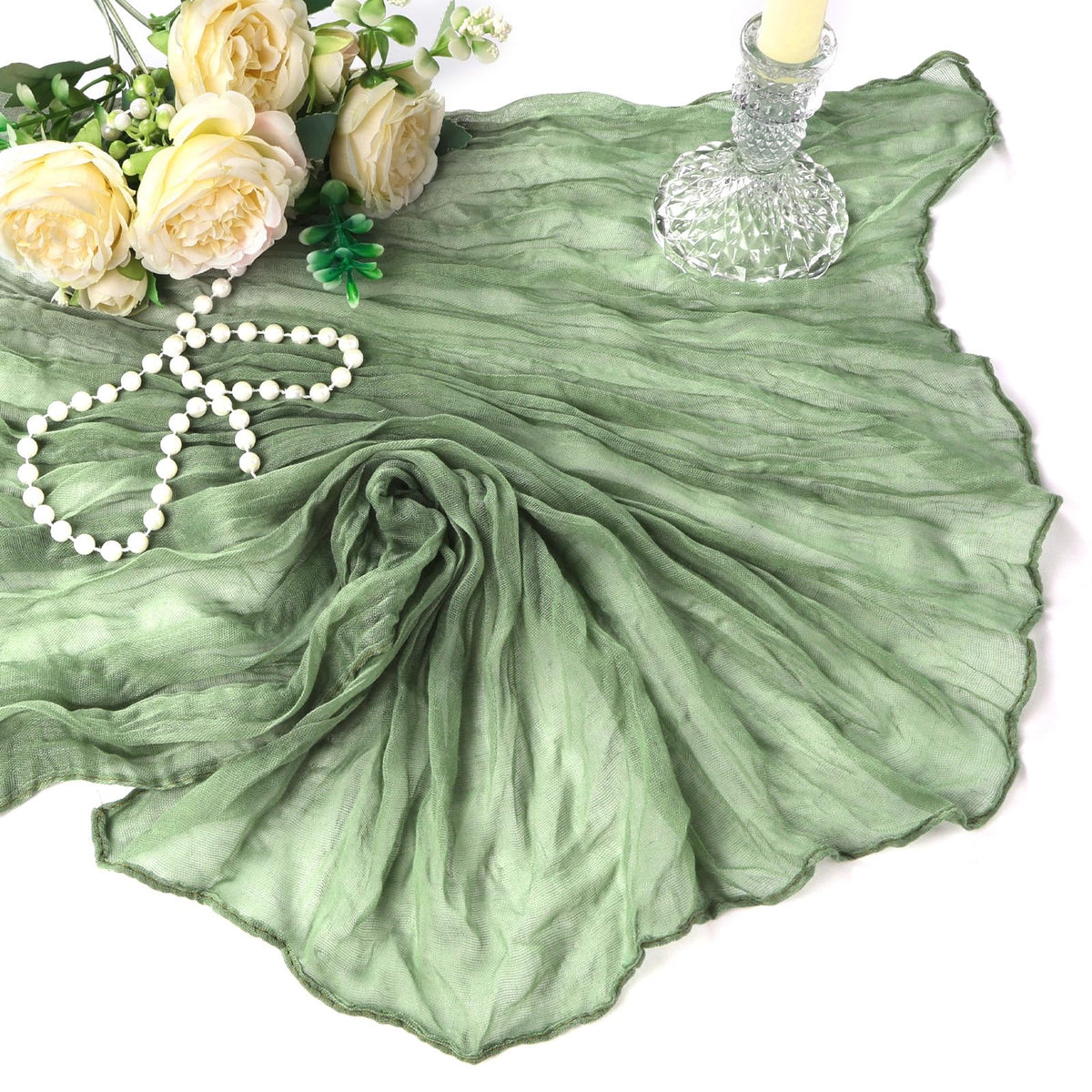 Heneger sage green table runner is easy care for reusable events.