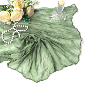 Heneger sage green table runner is easy care for reusable events.