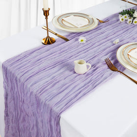 Wedding table decor with Heneger draped lilac runner