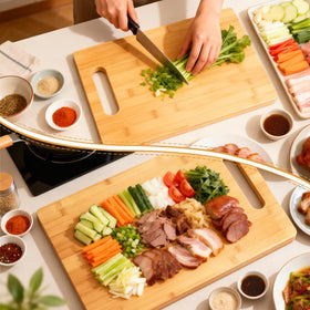 Henghere cutting board in use for prep and serving