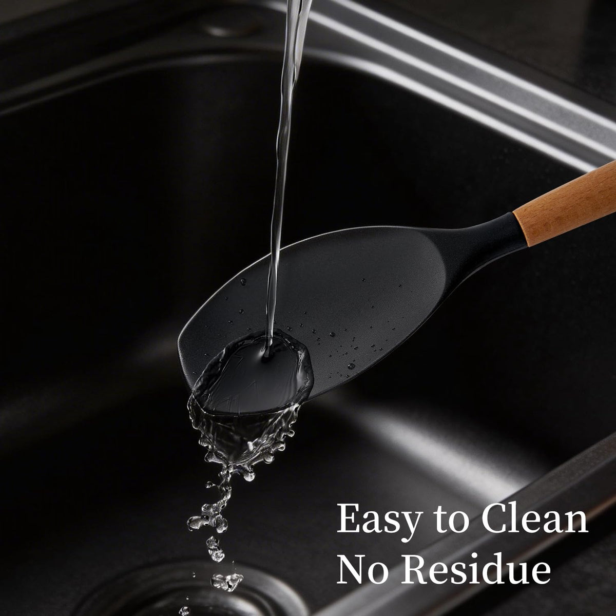 Henkeliving silicone slotted spoon with wood handle for serving without scratches.