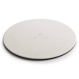 Heritage pizza stone includes bonus cutter for convenient pizza slicing.