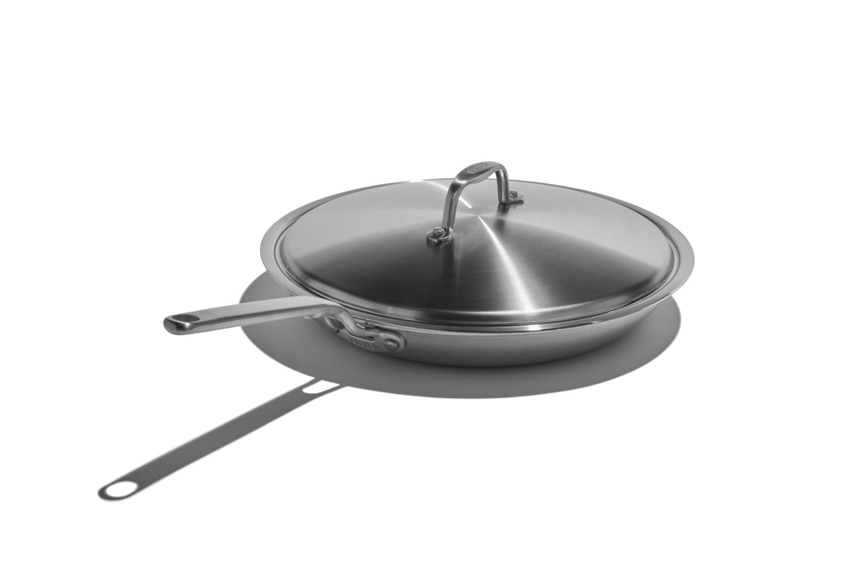 Heritage Steel Eater 12-inch frying pan with lid showing even heat and searing capability
