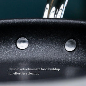 Flush rivets on Hestan TITUM pan reduce food buildup for easy cleaning.