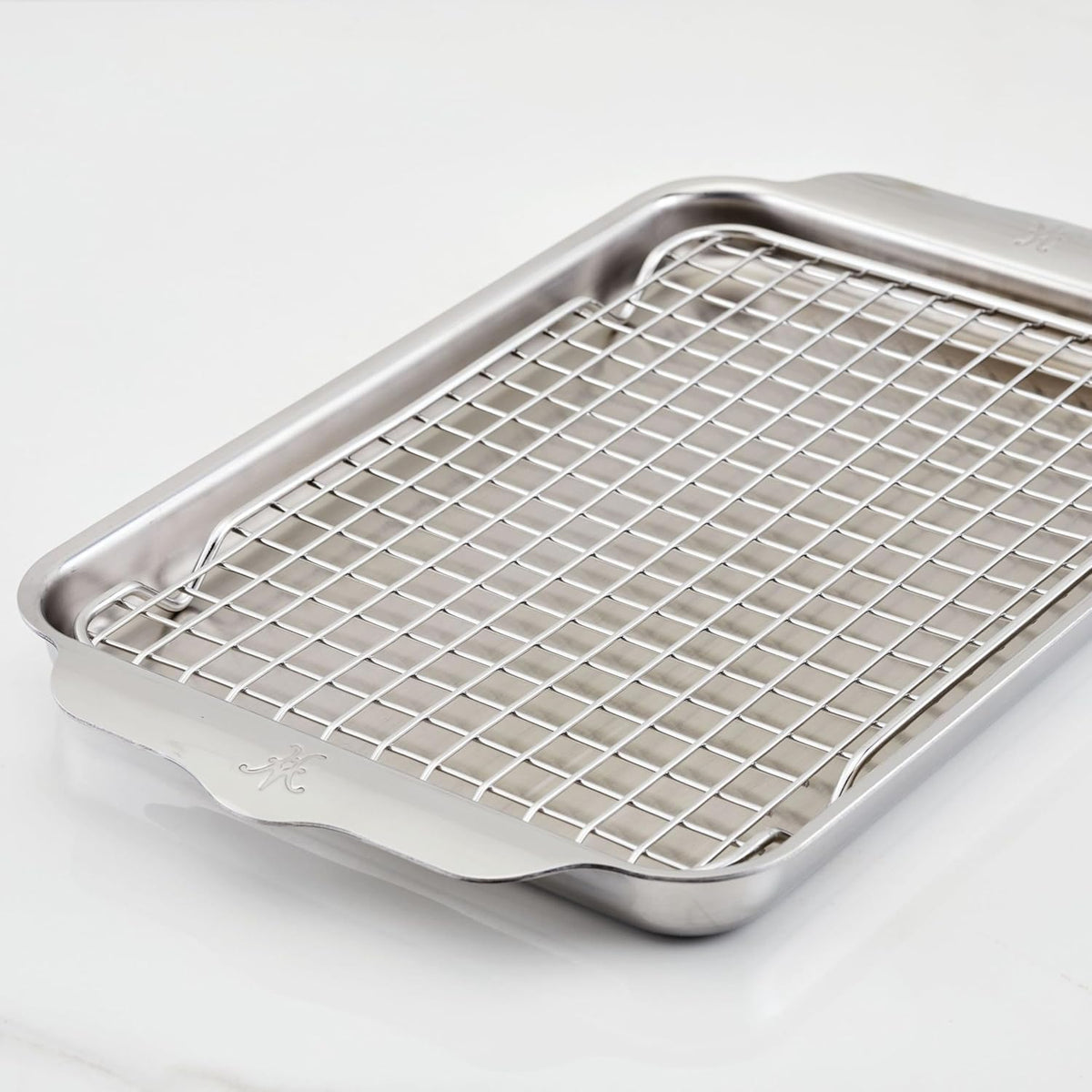 Hestan Provisions OvenBond pan with wide curved handles for secure grip