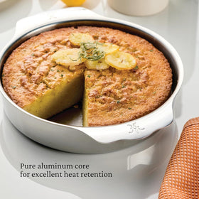 Hestan Provisions OvenBond Round Baker wide handles enable secure grip with oven mitts.