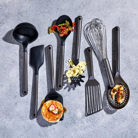 HexClad spoon in gunmetal finish for versatile stirring.