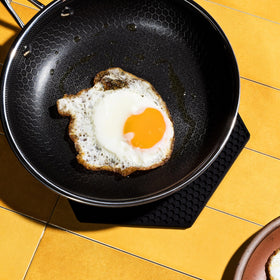 HexClad easy-clean silicone trivet wipes clean with a damp cloth