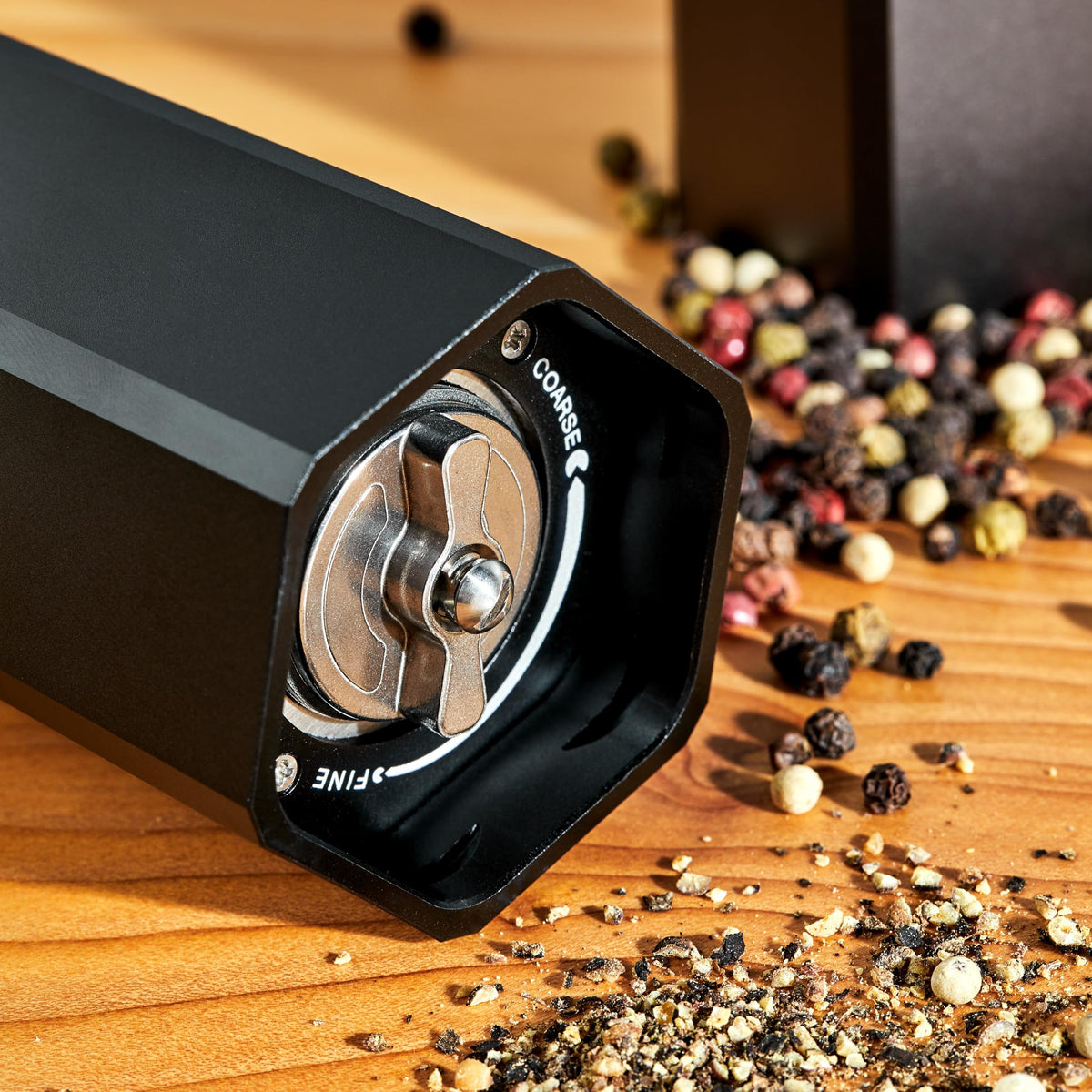 HexClad HexMill no-mess bottom cap keeps surfaces clean during cooking.