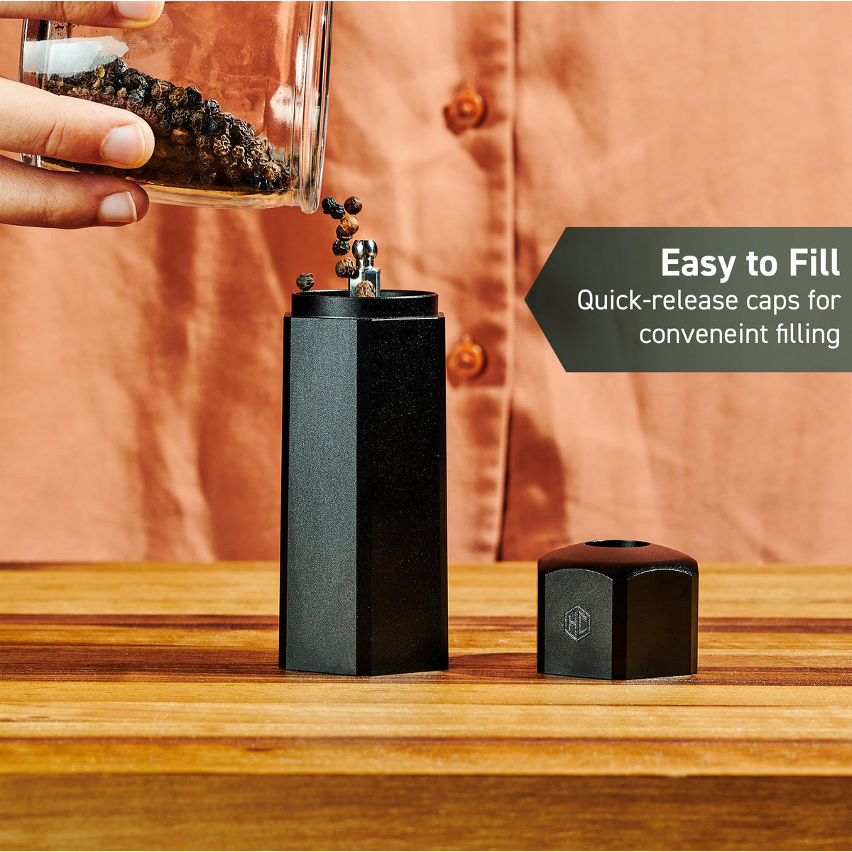 HexClad HexMill stand keeps the spice on the table tidy and accessible.
