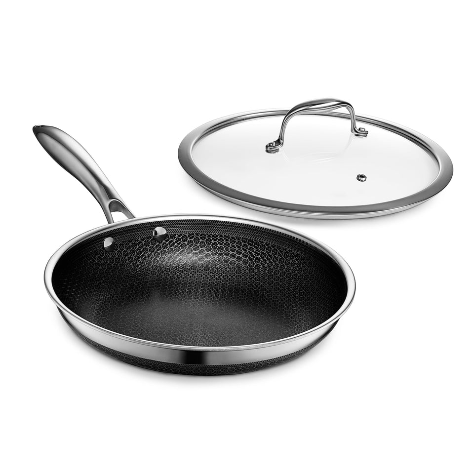HexClad Hybrid 10-Inch Pan with tempered glass lid for even searing.