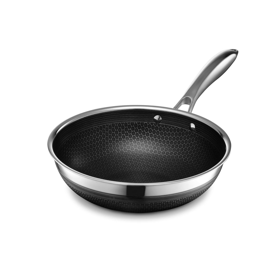 HexClad Hybrid 10-inch Wok handle close-up for safe, comfortable stirring.